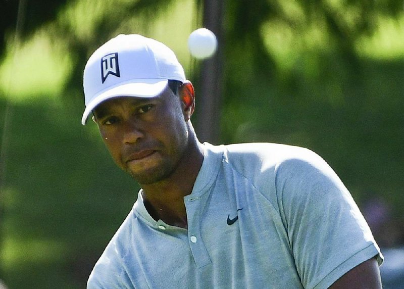 Tiger Woods followed Thursday’s 5-under 65 with a 68 on Friday  and is tied for the lead with Justin Rose heading into today’s  third round at the PGA Tour Championship. 