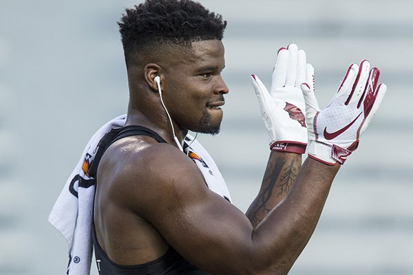 Arkansas linebacker Dre Greenlaw claps during warmups prior to a game against Auburn on Saturday, Sept. 22, 2018, in Auburn, Ala. 