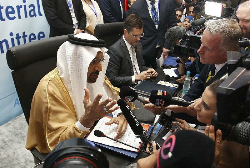 Khalid Al-Falih, Saudi Arabia’s minister of energy, speaks to journalists Sunday during OPEC’s 10th meeting of the Joint Ministerial Committee in Algiers, Algeria. OPEC and its allies declined to boost oil output despite pressure from the U.S., which sent the price of Brent above $80 a barrel on Monday. 