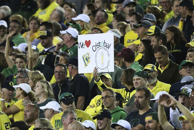 Oregon fans watch Saturday’s game against Stanford in Eugene, Ore. In a video posted by The Athletic’s Chantel Jennings, several fans were shown throwing bottles at Stanford players as they left the field into the tunnel at Autzen Stadium after the Ducks lost 38-31 in overtime.