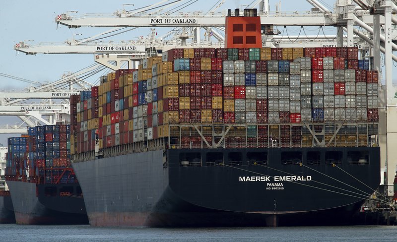 FILE - In this Thursday, July 12, 2018, file photo, the container ship Maersk Emerald is unloaded at the Port of Oakland, Calif. China has raised tariffs on $60 billion of U.S. imports in an escalation of their trade battle following a deadline for President Donald Trump&#x2019;s latest increase. (AP Photo/Ben Margot, File)