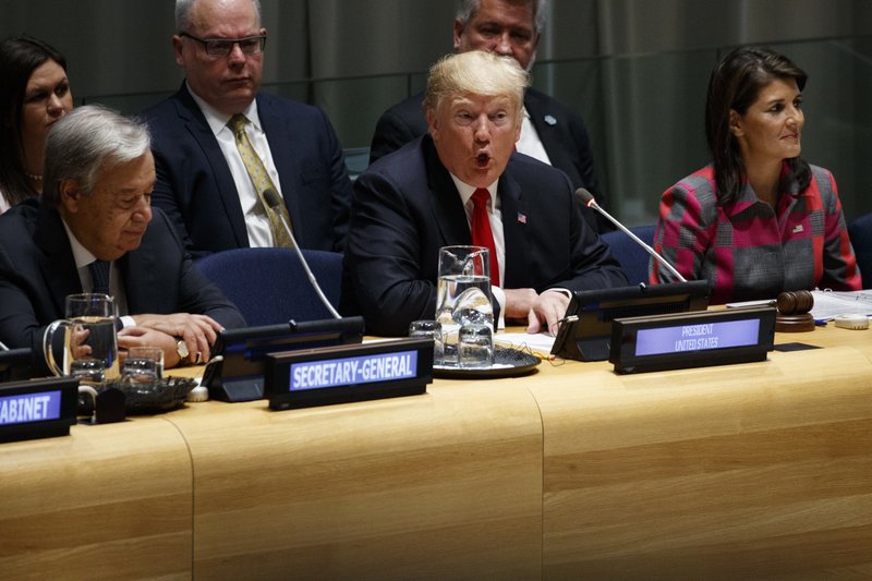 United Nations Secretary General Antonio Guterres, left, and U.S. Ambassador to the United Nations Nikki Haley, right, listen as President Donald Trump speaks during the &quot;Global Call to Action on the World Drug Problem&quot; at the United Nations General Assembly, Monday, Sept. 24, 2018, at U.N. Headquarters. (AP Photo/Evan Vucci)
