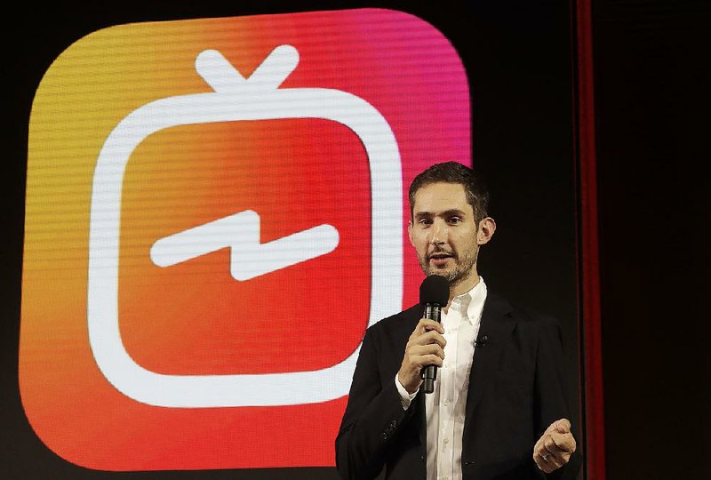 Instagram co-founders Kevin Systrom, shown at a media event in June, and Mike Krieger have been at Facebook since it acquired Instagram in 2012. 