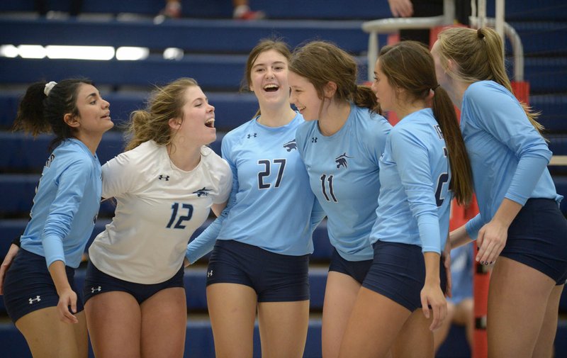 NWA Democrat-Gazette/ANDY SHUPE Springdale Har-Ber's Lizbeth Puente (from left), Molly Kingston, Taylor Rushing, Mackenzie White, Skylar Fernandez and Kat Cooper celebrate a point against Bentonville Tuesday, Sept. 25, 2018, during play in Wildcat Arena in Springdale. Visit nwadg.com/photos to see more photographs from the match.