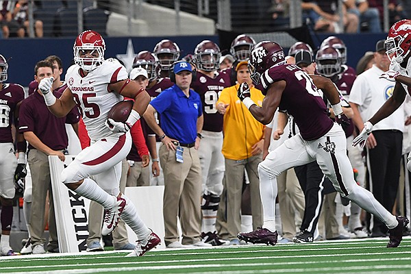 Arkansas tight end Cheyenne O'Grady runs with the ball during a game against Texas A&M on Saturday, Sept. 29, 2018, in Arlington, Texas. Arkansas tight end Cheyenne O'Grady runs with the ball during a game against Texas A&M on Saturday, Sept. 29, 2018, in Arlington, Texas.