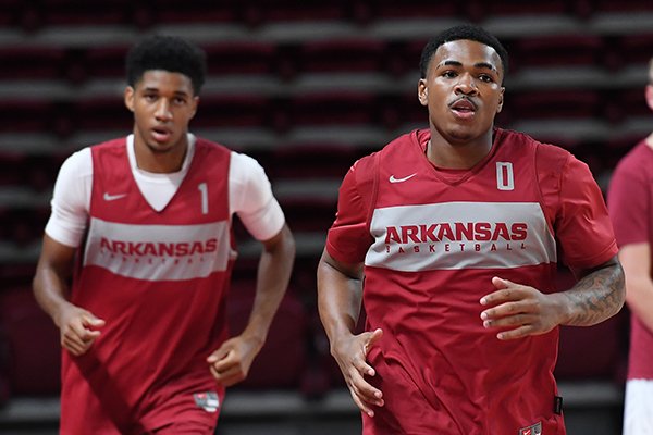 NWA Democrat-Gazette/J.T. WAMPLER Razorbacks' Desi Sills (RIGHT) and Isiah Joe at practice Monday Oct. 1, 2018 at Bud Walton Arena in Fayetteville.