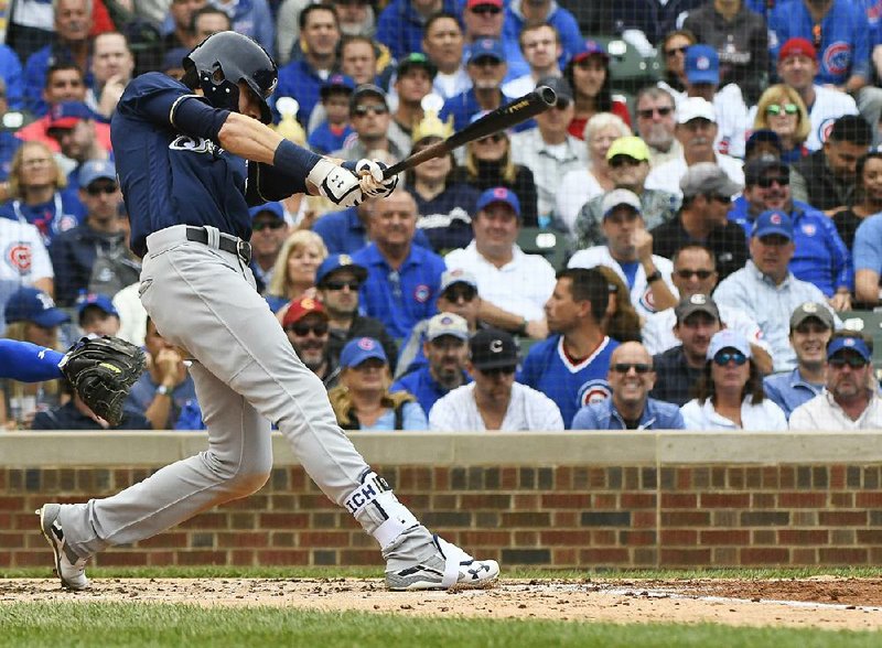 Brewers celebrating inside the visitor's clubhouse at Wrigley Field