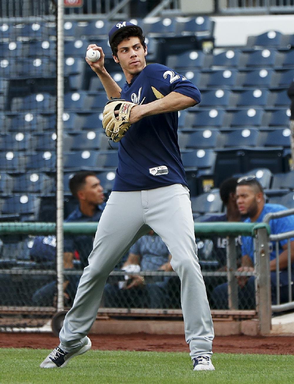 Milwaukee Brewers' Lorenzo Cain and Orlando Arcia smile during the