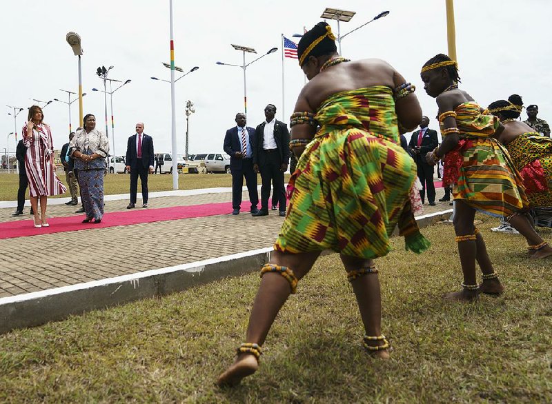 Melania Trump and Ghana’s first lady Rebecca Akufo-Addo watch dancers Tuesday during an arrival ceremony for the U.S. first lady. 