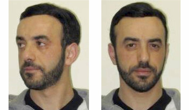 FILE - This July 9, 2018 file screenshot of the Interpol website shows portraits of notorious French criminal, Redoine Faid, as part of Interpol's wanted notice. Police have caught one of France's most wanted men, three months after his spectacular helicopter escape from prison. French Justice Minister Nicole Belloubet said on Europe 1 radio that Redouine Faid was arrested early Wednesday in Creil, north of Paris, without resistance. (Interpol via AP, File)

