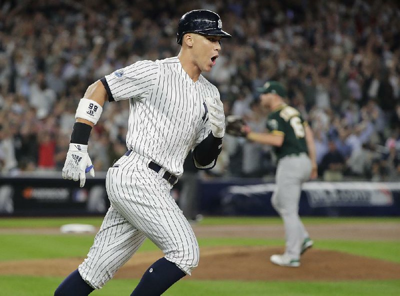 Yankees right fielder Aaron Judge hits his 20th home run