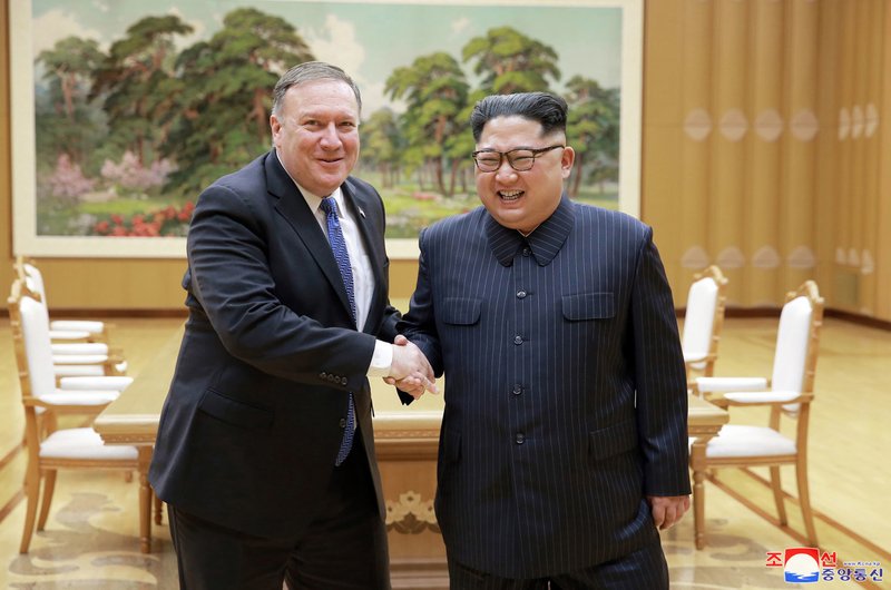In this May 9, 2018, file photo provided by the North Korean government, U.S. Secretary of State Mike Pompeo, left, shakes hands with North Korean leader Kim Jong Un during a meeting at Workers' Party of Korea headquarters in Pyongyang, North Korea.  