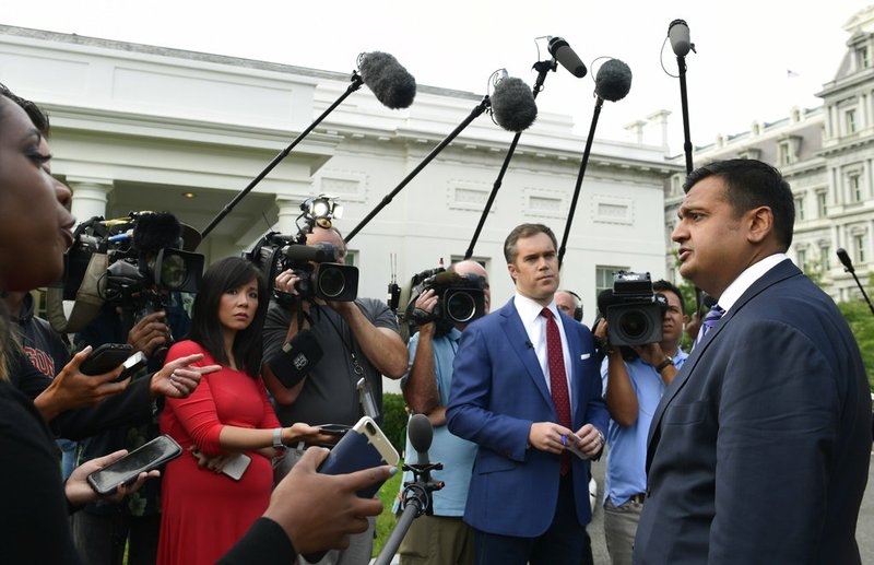 White House spokesman Raj Shah talks to reporters about the FBI investigation of Supreme Court nominee Brett Kavanaugh outside the West Wing of the White House in Washington, Thursday, Oct. 4, 2018. (AP Photo/Susan Walsh)