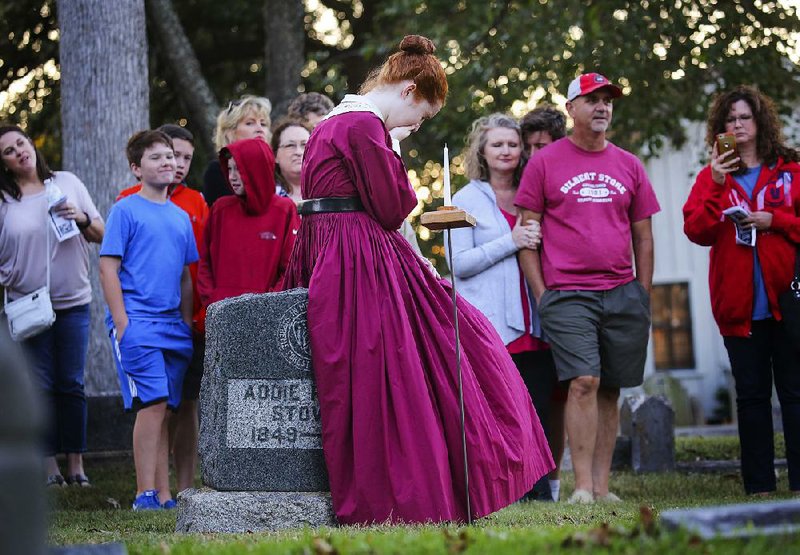 Parkview student Annaleise Anderson portrays the ghost of 19th-century Arkansan Catherine Eller Henderson for the 2017 “Tales of the Crypt” at Little Rock’s Mount Holly Cemetery.