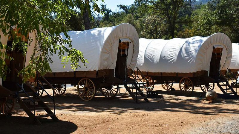 “Glamping” meets the pioneer life at Yosemite Pines Resort in Groveland, Calif., which has six Conestoga wagons people can stay in. The wagons are air-conditioned and roomier than the ones pioneers traveled in. 