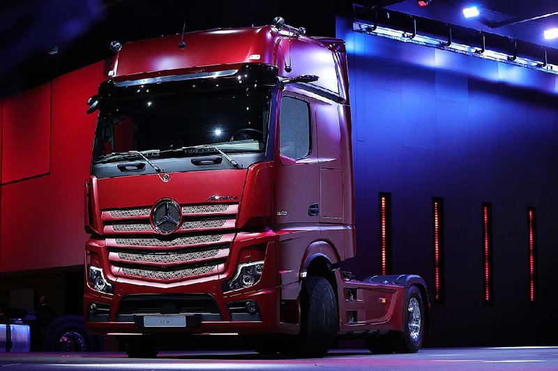 A new Mercedes-Benz Actros semi-autonomous truck sits onstage at September’s IAA Commercial Vehicles Show in Hanover, Germany. 