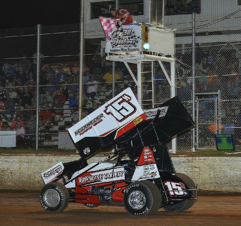 Sam Hafertepe Jr. of Sunnyvale, Texas, takes the checkered flag to win the ASCS national tour race May 12 at I-30 Speedway in Little Rock. Hafertepe and the rest of the other drivers at this weekend’s 31st annual Comp Cams Short Track Nationals will be trying to find a way to beat five-time winner Sammy Swindell.