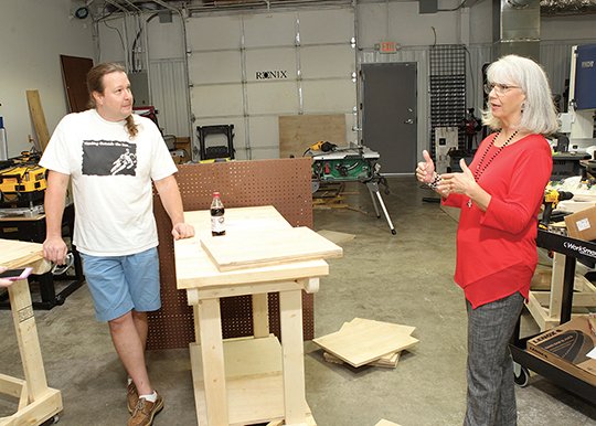 The Sentinel-Record/Richard Rasmussen BUILDING SPACE: Julian Post, left, educational programs coordinator, and Robin Pelton, program director, on Thursday discuss the new Makerspace opening in National Park College's Innovative Technologies Center later this month.