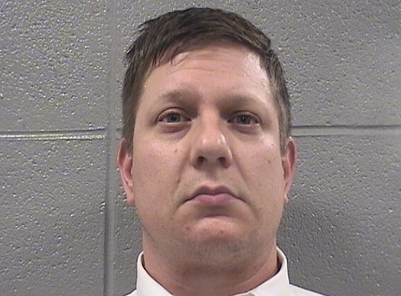 This Oct. 5, 2018 photo provided by the Cook County Sheriff's Office in Chicago, Ill., shows Jason Van Dyke. Van Dyke, a Chicago police Officer, was taken into custody and photographed, after jurors found him guilty of second-degree murder and aggravated battery in the 2014 shooting of black teenager Laquan McDonald, at the Leighton Criminal Court Building on Friday, Oct. 5, in Chicago. (Cook County Sheriff's Office via AP)