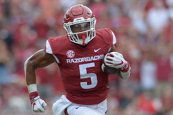 Arkansas running back Rakeem Boyd carries the ball against Alabama Saturday, Oct. 6, 2018, during the second quarter at Razorback Stadium in Fayetteville. Visit nwadg.com/photos to see more photographs from the game.