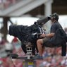 An ESPN camera operator shoots a game between Arkansas and Alabama on Saturday, Oct. 6, 2018, in Fayetteville.