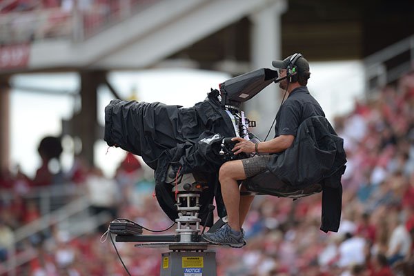 An ESPN camera operator shoots a game between Arkansas and Alabama on Saturday, Oct. 6, 2018, in Fayetteville.
