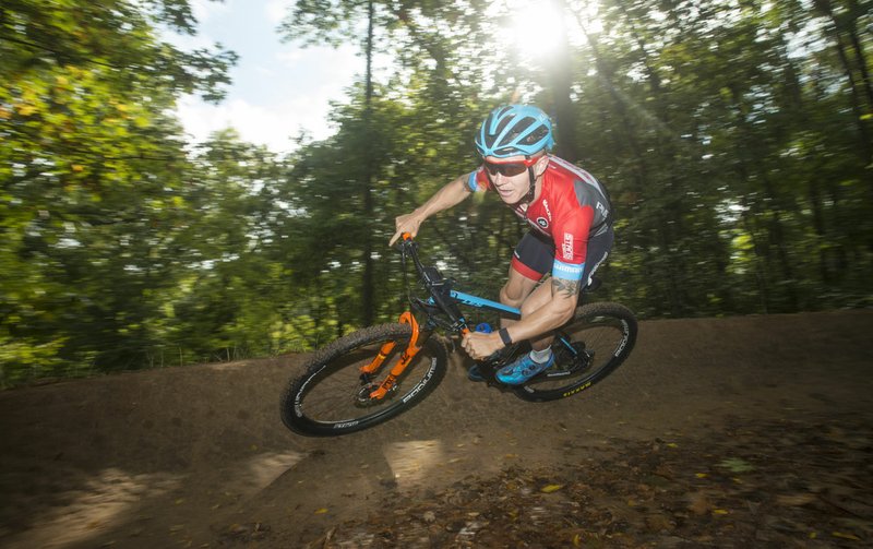 NWA Democrat-Gazette/BEN GOFF @NWABENGOFF Keegan Swenson rides Thursday, Oct. 4, 2018, on the All American Trail near Compton Gardens in Bentonville. Swenson, a professional cross-country cyclist with Stan's NoTubes-Pivot team, will be riding in The OZ Trails Off-Road this weekend on the trails in Bentonville and Bella Vista.