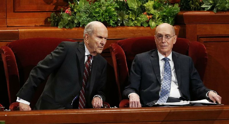 President Russell M. Nelson and his counselor Henry B. Eyring look on during the conference of The Church of Jesus Christ of Latter-day Saints on Saturday in Salt Lake City. 