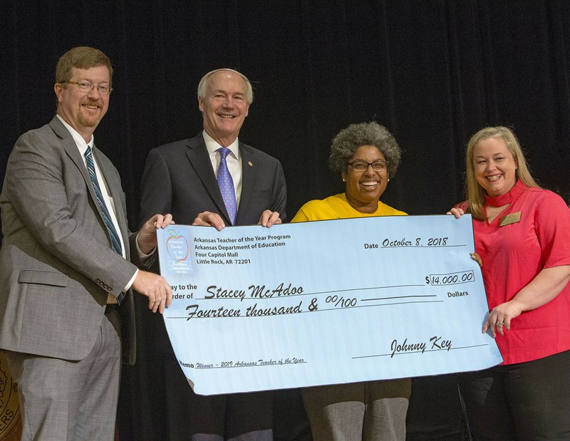 Arkansas Teacher of the Year Stacey McAdoo received a $14,000 check as part of her award. Photo courtesy of the Arkansas Department of Education