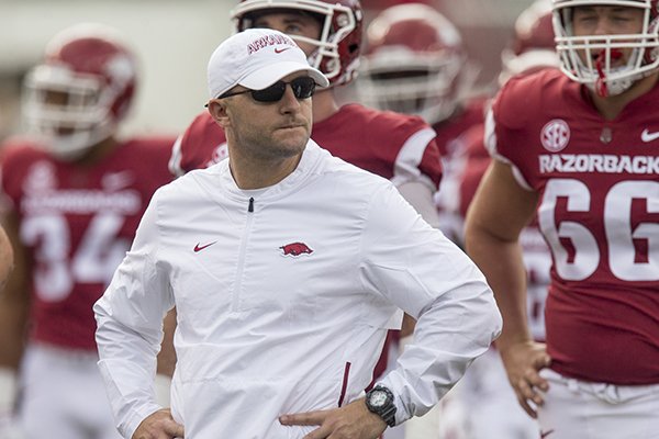 Joe Craddock, Arkansas offensive coordinator, during warmups before the game vs Alabama Saturday, Oct. 6, 2018, at Razorback Stadium in Fayetteville.