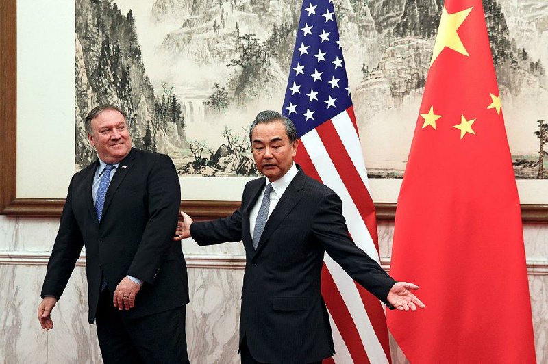 Secretary of State Mike Pompeo meets with Chinese counterpart Wang Yi on Monday in Beijing.