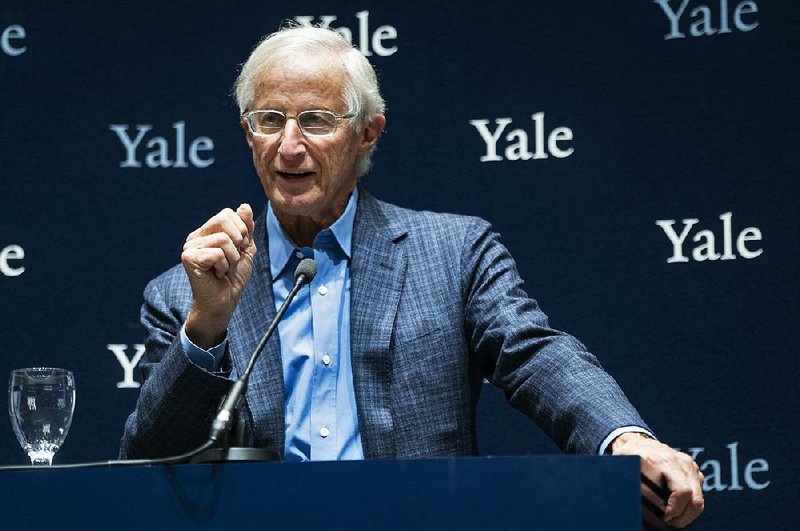 Yale University professor William Nordhaus, a 2018 winner of the Nobel Prize in economics, speaks about the honor Monday in New Haven, Conn.