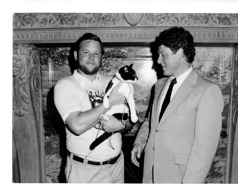 Michael Storey and Otus the Head Cat meet then-Gov. Bill Clinton at the state Capitol in 1984.