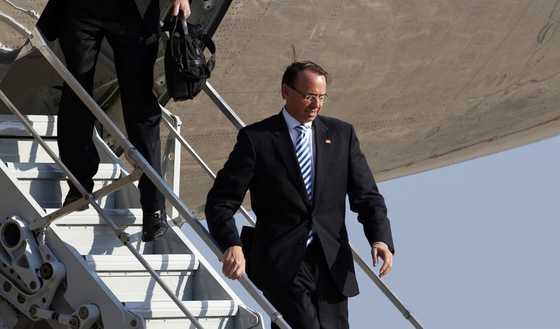 The Associated Press DEPARTURE: Deputy Attorney General Rod Rosenstein steps off Air Force One as he arrives Monday, at Andrews Air Force Base, Md.