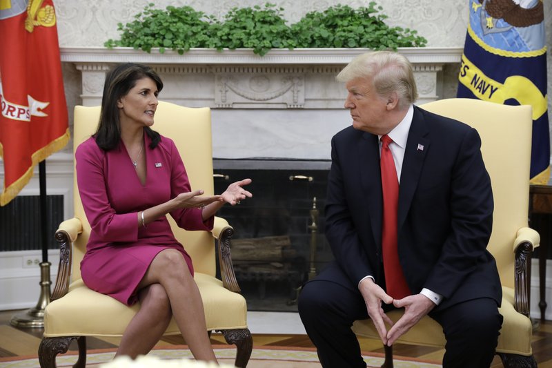 President Donald Trump meets with outgoing U.S. Ambassador to the United Nations Nikki Haley in the Oval Office of the White House, Tuesday, Oct. 9, 2018, in Washington. (AP Photo/Evan Vucci)

