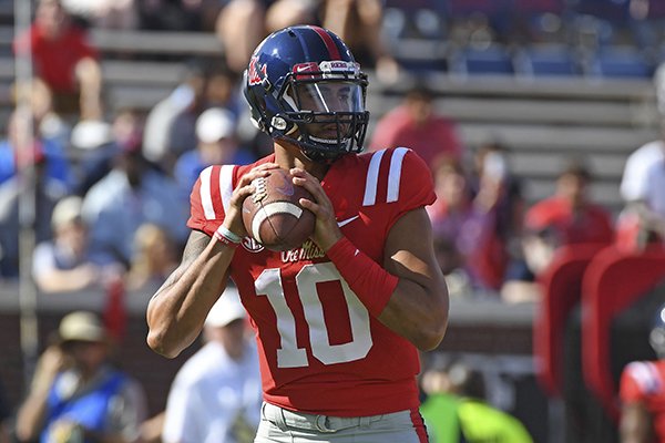 Ole Miss quarterback Jordan Ta'amu (10) looks to pass during the first half of an NCAA college football game against Louisiana Monroe in Oxford, Miss., Saturday, Oct. 6, 2018. (AP Photo/Thomas Graning)

