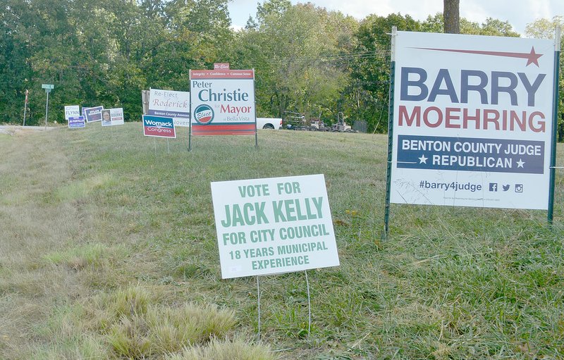 Keith Bryant/The Weekly Vista Campaign signs are sprouting up all over Bella Vista.