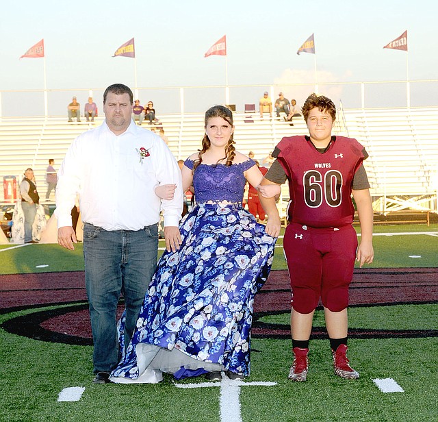 Photo courtesy of LifeTouch National Studios/Lincoln freshman maid Honesty Rice, daughter of Jonathan and Kimberly Rice, escorted by her father, and junior Kade Gibson, son of Adam and Anna Yiamkis.