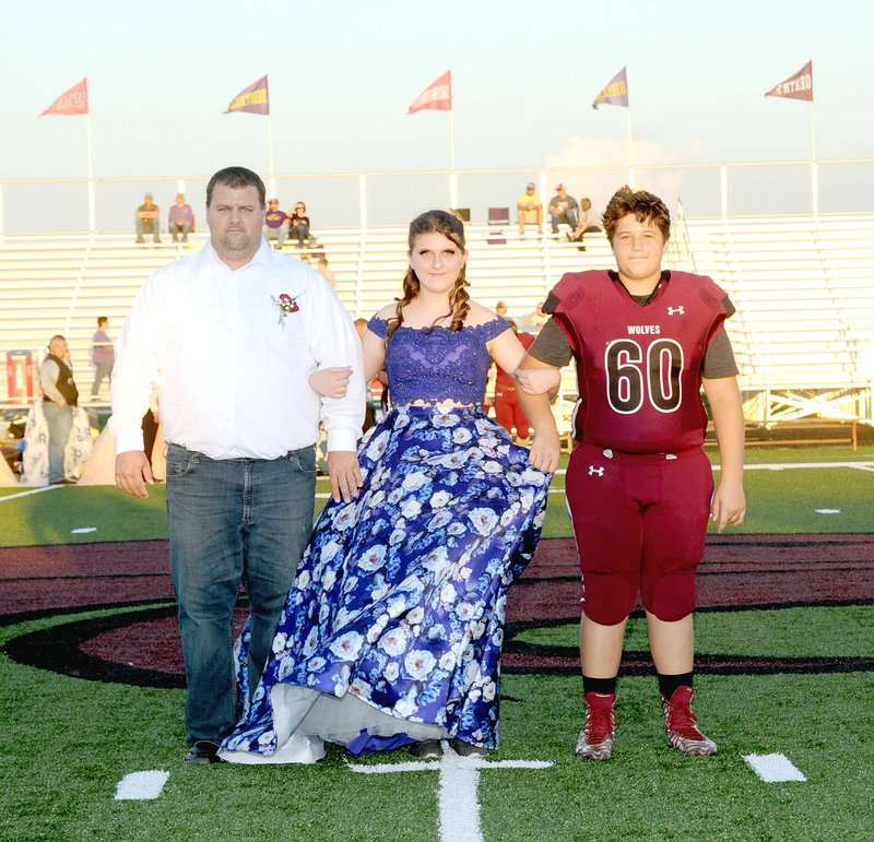 Photo courtesy of LifeTouch National Studios/Lincoln freshman maid Honesty Rice, daughter of Jonathan and Kimberly Rice, escorted by her father, and junior Kade Gibson, son of Adam and Anna Yiamkis.
