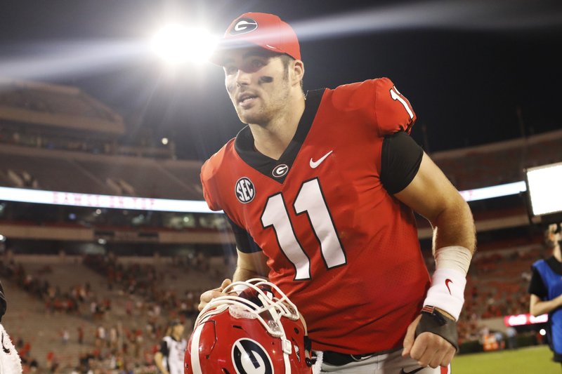 Georgia quarterback Jake Fromm heads off the field after the team's win over Vanderbilt in an NCAA college football game Saturday, Oct. 6, 2018, in Athens, Ga. (Joshua L. Jones/Athens Banner-Herald via AP)