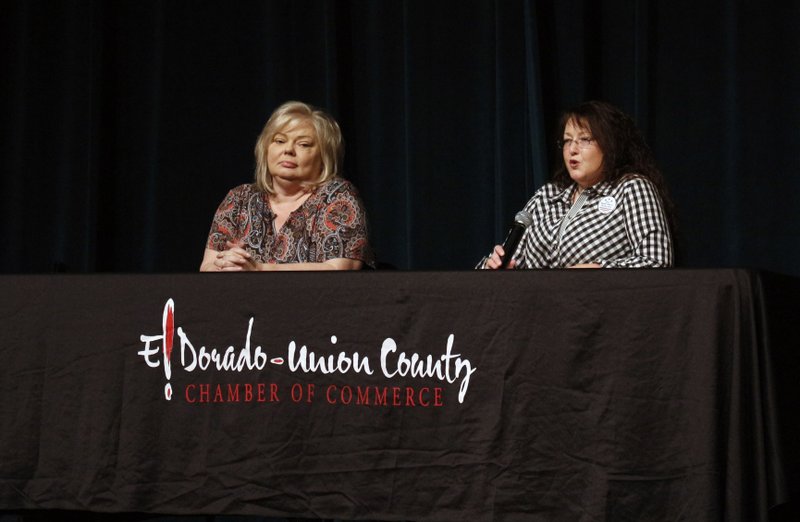 Union County Clerk Shannon Phillips and challenger Goldie Hilburn respond to questions Tuesday at a public forum held at the El Dorado Municipal Auditorium.