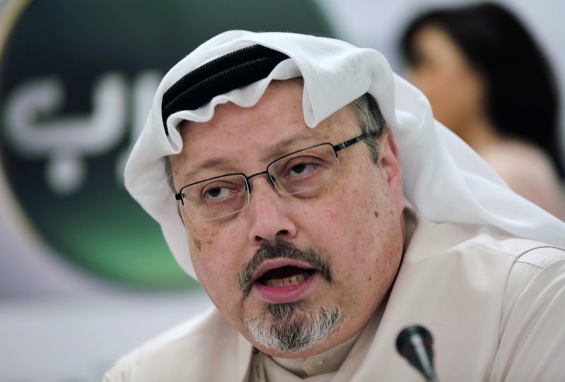 In this Feb. 1, 2015, file photo, Saudi journalist Jamal Khashoggi speaks during a press conference in Manama, Bahrain. Turkish claims that Khashoggi, who wrote for The Washington Post, was slain inside a Saudi diplomatic mission in Turkey, has put the Trump administration in a delicate spot with one of its closest Mid-east allies. (AP Photo/Hasan Jamali, File)