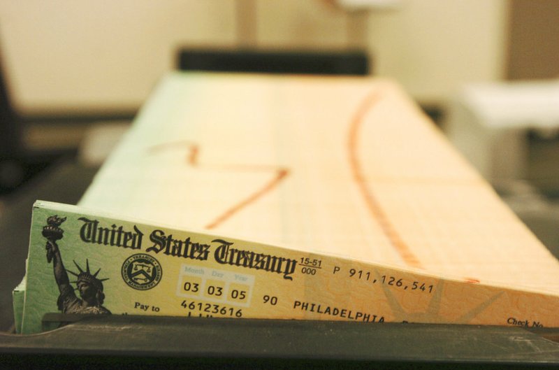 In this Feb. 11, 2005, file photo, trays of printed social security checks wait to be mailed from the U.S. Treasury's Financial Management services facility in Philadelphia. 