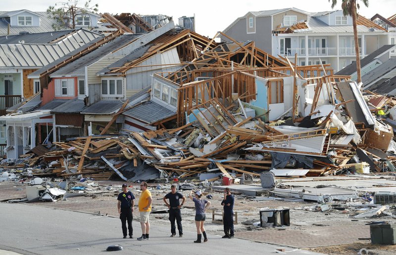 Rescue personnel perform a search in the aftermath of Hurricane Michael in Mexico Beach, Fla., Thursday, Oct. 11, 2018. (AP Photo/Gerald Herbert)