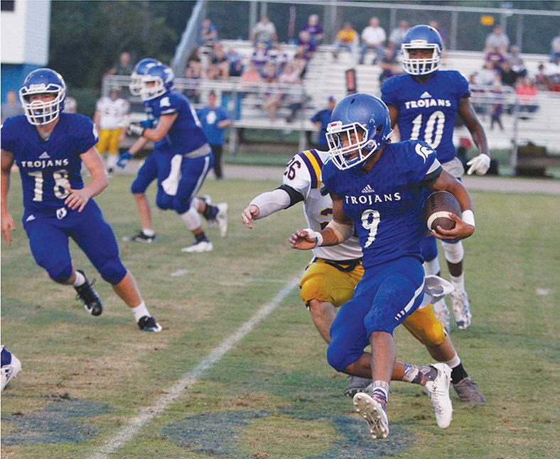 Terrance Armstard/News-Times Parkers Chapel's Ryan Simpson (9) looks for an opening during the Trojans' contest against Mayflower earlier this season at Parkers Chapel. Tonight, the Trojans host Fordyce in an 8-2A showdown in their first home game in nearly a month. Game time is set for 7 p.m.