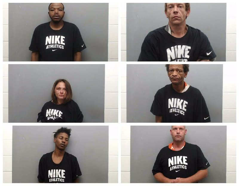 A collection of booking photos taken from the Union County sheriff’s office website shows suspects wearing Nike T-shirts. The sheriff denies that the suspects were forced to wear the shirts in their booking photos.