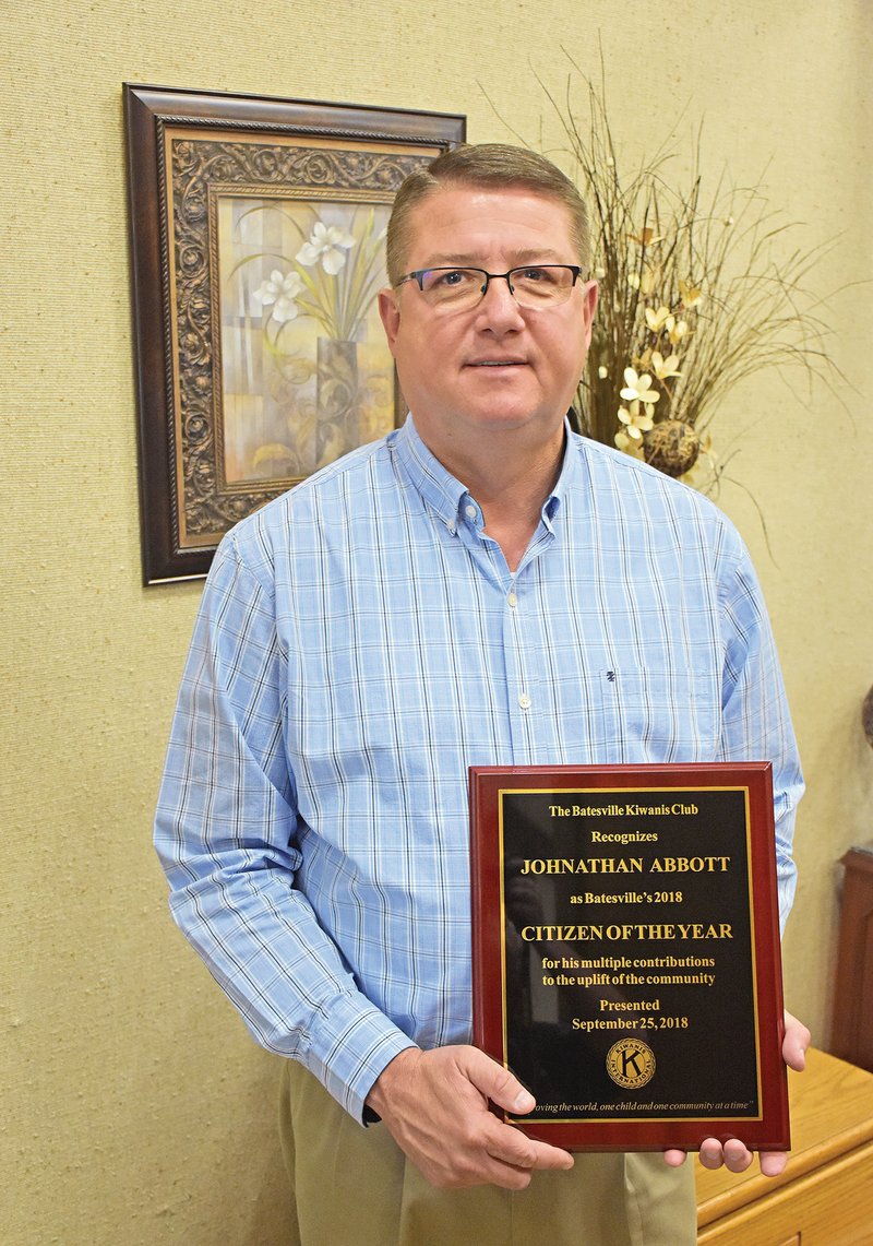 Johnathan Abbott, the landscape supervisor for the city of Batesville, holds his plaque for being honored as the Batesville Kiwanis Citizen of the Year at a banquet Sept. 25. Abbott has worked for the city in some capacity since May 1990.