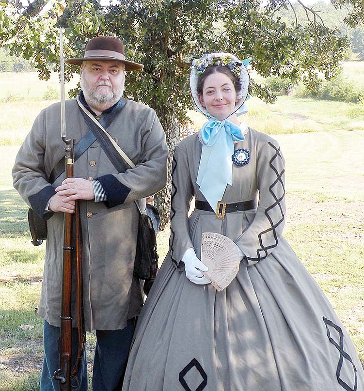Robert Swain and Lissa Bryan, dressed in period costumes, will be among the speakers at Saturday’s Civil War Symposium at the Museum of Veterans and Military History in Vilonia. Both are active in living history and re-enactments throughout the state.