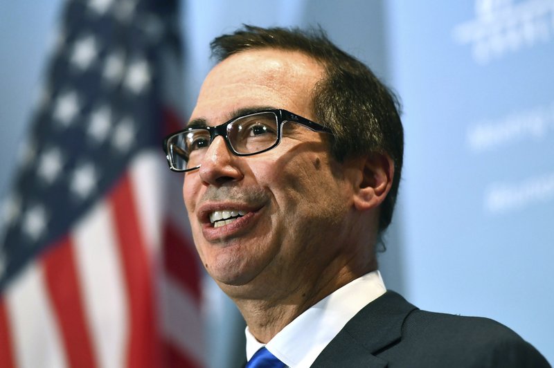 In this June 2, 2018 file photo, U.S. Treasury Secretary Steven Mnuchin speaks at a news conference during a meeting for the G7 Finance and Central Bank Governors in Whistler, British Columbia. 