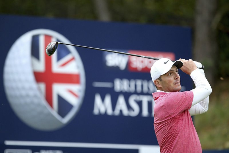 The Associated Press RYDER RETURN: Francesco Molinari plays a shot on Friday during day two of the British Masters at Walton Heath Golf Club in Surrey, England.